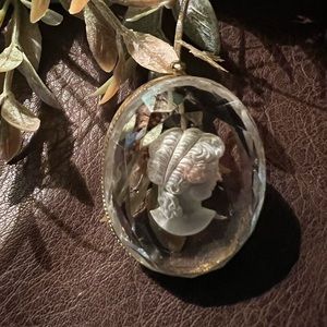 Beautiful faux cameo pendant.